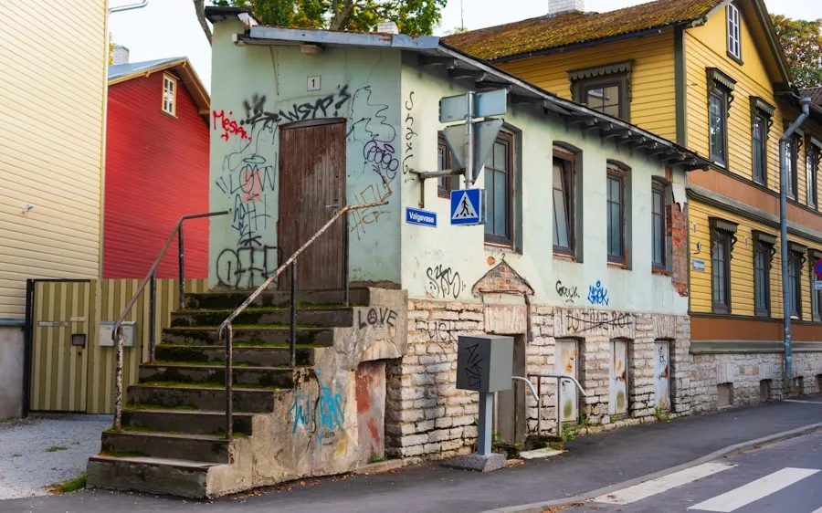 Wooden building with graffiti in Kalamaja, Tallinn