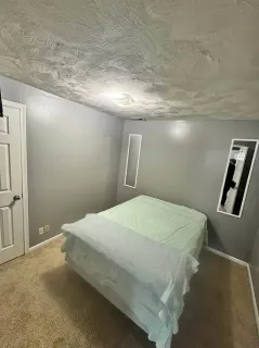 Bedroom in lived-in flat