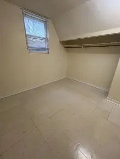 Bedroom in lived-in flat