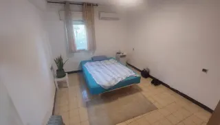 Camera con letto, da completare a piacere